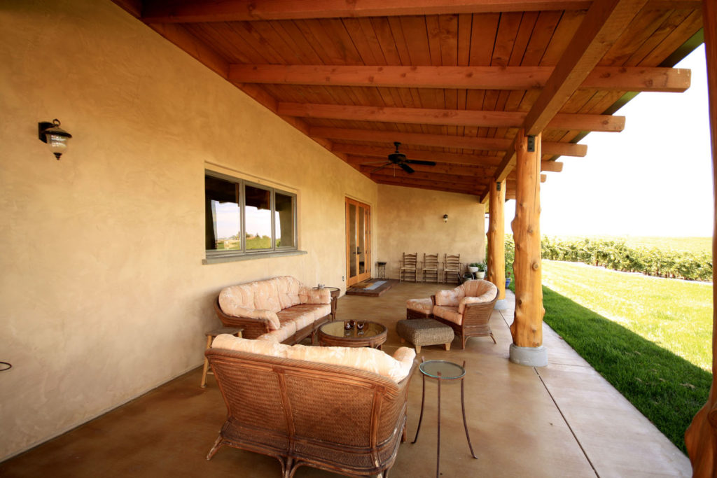 AUSTRALIAN-INSPIRED STRAW BALE - Paso Robles, California - Thick straw bale walls to insulate against heat, peeled cedar posts, outdoor living features
